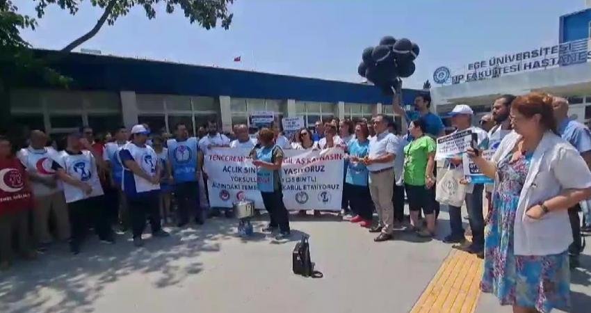 İzmir’de Sağlıkçılar Enflasyon Rakamlarını Tencerede Taş Kaynatarak Protesto Etti İzmir’de sağlık çalışanları, Türkiye İstatistik Kurumu (TÜİK)’nun haziran ayı enflasyon