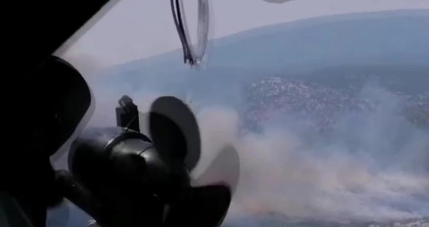 İzmir'in Urla ilçesinde makilik alanda yangını çıktı. Havadan ve karadan