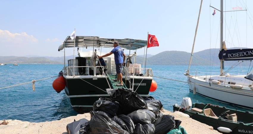 Muğla Büyükşehir Belediyesi ekipleri, Gökova Körfezi'nde araç yolu olmayan koylardaki