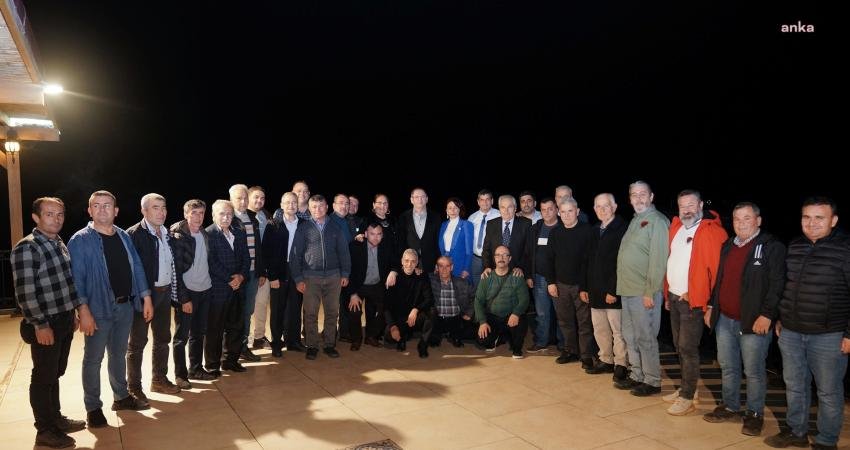 Ayvalık Belediye Başkanı Mesut Ergin, muhtarlar ve eşleriyle bir araya
