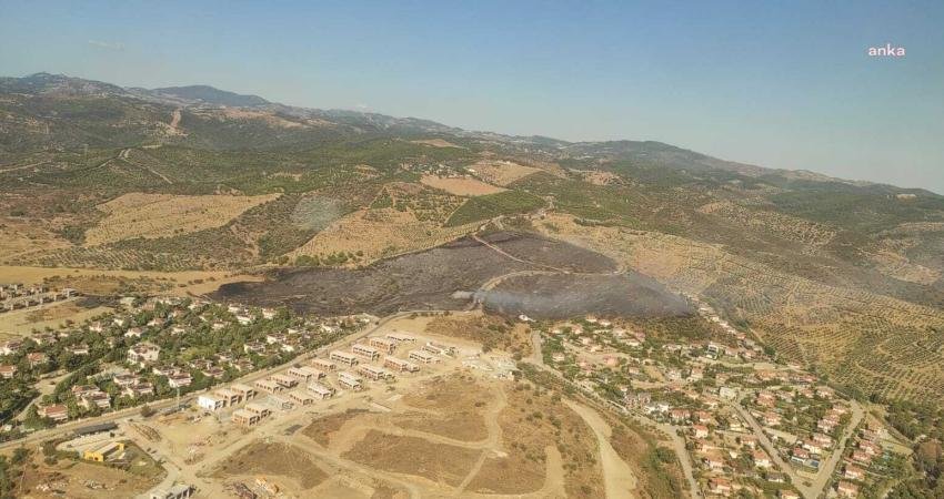 İzmir'in Urla ilçesinde çıkan orman yangını havadan ve karadan müdahalenin
