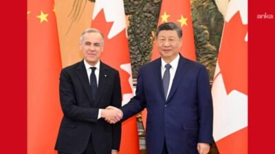 Çin Devlet Başkanı Şi Cinping ile Kanada Başbakanı Mark Carney,