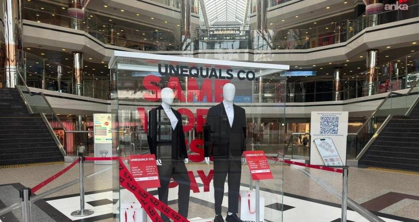 Kadın ve erkekler arasındaki ücret eşitsizliği vitrinle görünür kılındı İstanbul’da bir alışveriş merkezinde 8 Mart Dünya Emekçi Kadınlar Günü