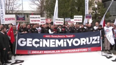 Hazine ve Maliye Bakanlığı önünde ayak bileklerine "fatura, giyim, kira,