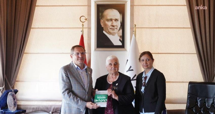 Ayvalık Belediye Başkanı Mesut Ergin'in, Teferiç Şenlikleri kapsamında ilçede ağırladığı