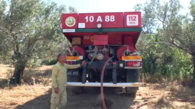 Balıkesir’in Burhaniye ilçesinde bir otomobilden çıkıp araziye sıçrayan yangında çok