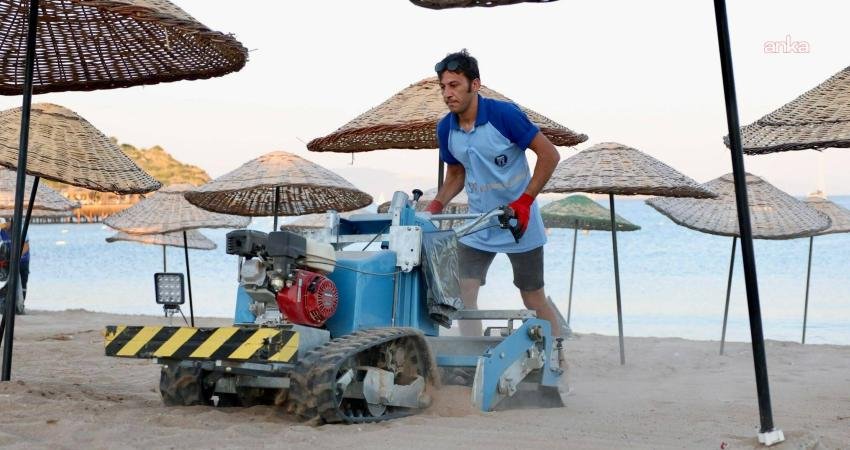 Didim Belediyesi ekipleri, ilçe genelindeki plajlarda kum eleme ve temizlik
