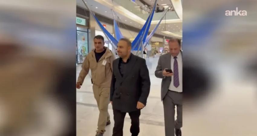 Afyonkarahisar’daki bir alışveriş merkezinde iş yerlerini denetliyormuş gibi görüntülerinin sosyal