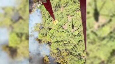 Muğla'nın Fethiye ilçesinde ormanlık alanda çıkan yangınına ekiplerin havadan ve