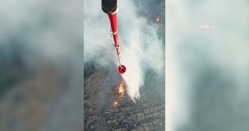 İzmir'in Çiğli ilçesinde otluk alanda çıkan yangın ekiplerin müdahalesiyle kontrol