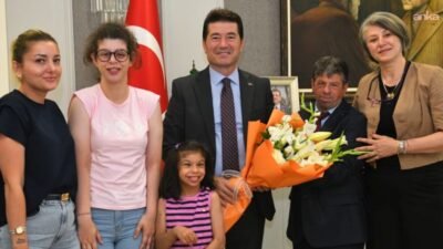 Williams Sendromu Derneği yöneticileri, 'Paşa' ismiyle tanınan Enver Öztürk’ün Ortahisar