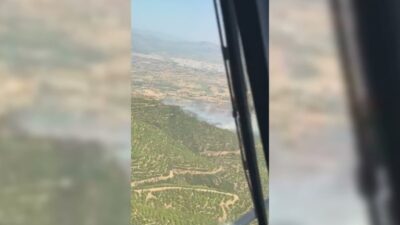 İzmir'in Ödemiş ilçesi Yeniköy Mahallesi'nde ormanlık alanda yangın çıktı. Ekiplerin