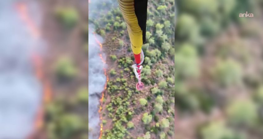 Muğla'nın Marmaris ilçesindeki Yalancı Boğaz yakınlarında çıkan yangın ormanlık alana