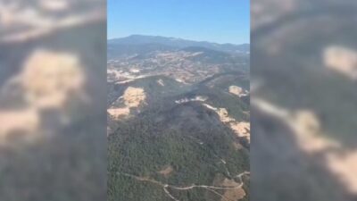 Balıkesir’in Sındırgı ilçesinde çıkan yangın, ekiplerin havadan ve karadan müdahalesiyle
