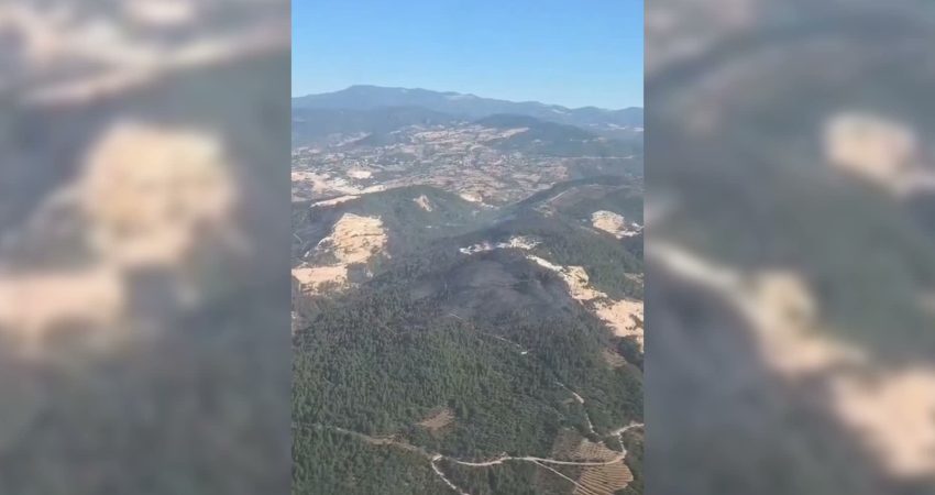 Balıkesir’in Sındırgı ilçesinde çıkan yangın, ekiplerin havadan ve karadan müdahalesiyle