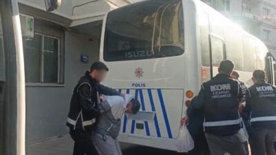 İzmir'de bir iş yeri ile önünde park halinde bulunan aracı